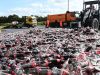 Afrit bezaaid met tienduizenden colaflesjes