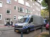 Handgranaat uit woning Rotterdam gehaald, verdachte geblinddoekt afgevoerd